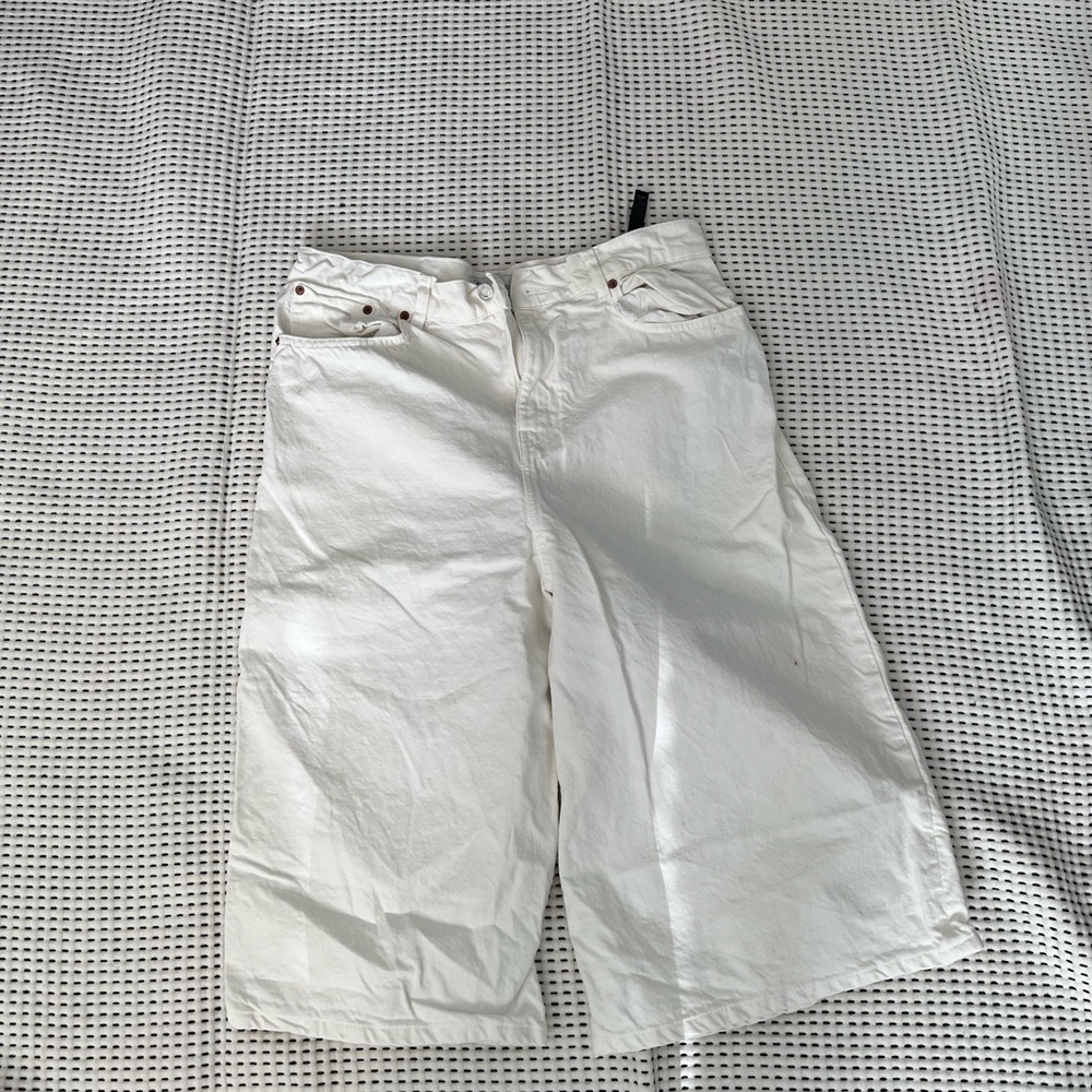 70s style white shorts.